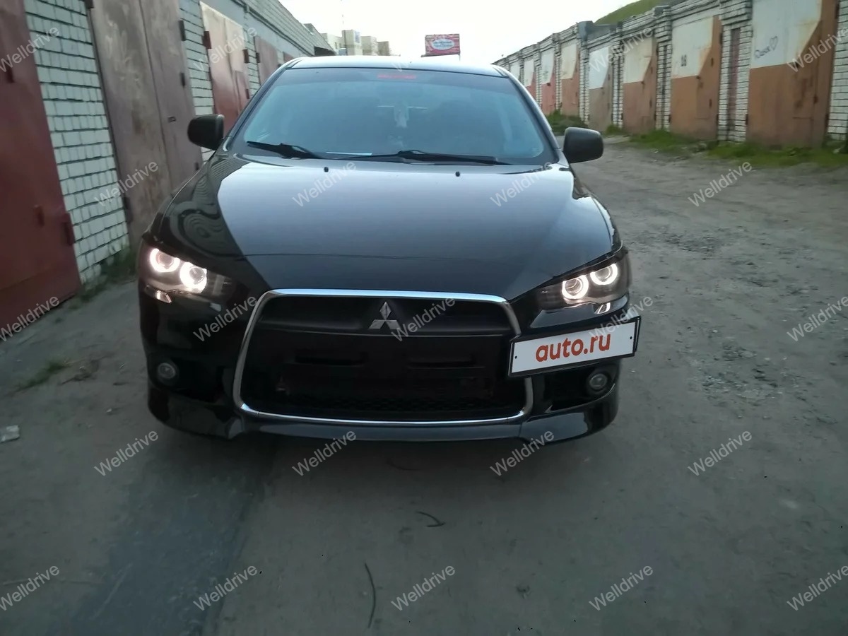 Клыки Mitsubishi Lancer X 10 переднего бампера рестайлинг